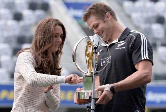 The Duchess of Cambridge and Richie McCaw with the Rugby World Cup during a Rippa Rugby tournament at the Forsyth Barr stadium in Dunedin during the seventh day of their official tour to New Zealand. ... Royal visit to Australia and NZ - Day 7 ... 14-04-2014 ... Dunedin ... New Zealand ... Photo credit should read: Anthony Devlin/PA Wire. Unique Reference No. ... Picture date: Sunday April 13, 2014. Photo credit should read: Anthony Devlin/PA Pool13/04/2014 - Dunedin