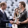 The Duke and Duchess of Cambridge and Richie McCaw (right) with the Rugby World Cup during a Rippa Rugby tournament at the Forsyth Barr stadium in Dunedin during the seventh day of their official tour to New Zealand. ... Royal visit to Australia and NZ - Day 7 ... 14-04-2014 ... Dunedin ... New Zealand ... Photo credit should read: Anthony Devlin/PA Wire. Unique Reference No. ... Picture date: Sunday April 13, 2014. Photo credit should read: Anthony Devlin/PA Pool13/04/2014 - Dunedin