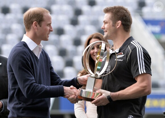 The Duke and Duchess of Cambridge and Richie McCaw (right) with the Rugby World Cup during a Rippa Rugby tournament at the Forsyth Barr stadium in Dunedin during the seventh day of their official tour to New Zealand. ... Royal visit to Australia and NZ - Day 7 ... 14-04-2014 ... Dunedin ... New Zealand ... Photo credit should read: Anthony Devlin/PA Wire. Unique Reference No. ... Picture date: Sunday April 13, 2014. Photo credit should read: Anthony Devlin/PA Pool13/04/2014 - Dunedin