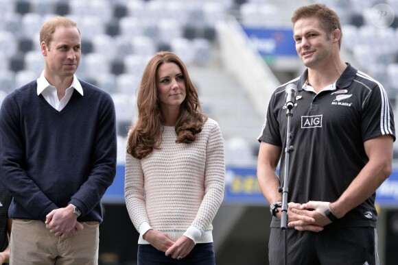 The Duke and Duchess of Cambridge listen to a speech from Richie McCaw (right) during a Rippa Rugby tournament at the Forsyth Barr stadium in Dunedin during the seventh day of their official tour to New Zealand. ... Royal visit to Australia and NZ - Day 7 ... 14-04-2014 ... Dunedin ... New Zealand ... Photo credit should read: Anthony Devlin/PA Wire. Unique Reference No. ... Picture date: Sunday April 13, 2014. Photo credit should read: Anthony Devlin/PA Pool13/04/2014 - Dunedin