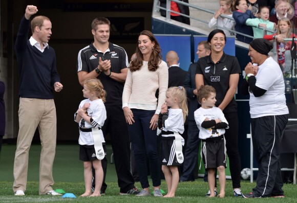 The Duke and Duchess of Cambridge and Richie McCaw (centre) watch a Rippa Rugby tournament at the Forsyth Barr stadium in Dunedin during the seventh day of their official tour to New Zealand. ... Royal visit to Australia and NZ - Day 7 ... 14-04-2014 ... Dunedin ... New Zealand ... Photo credit should read: Anthony Devlin/PA Wire. Unique Reference No. ... Picture date: Sunday April 13, 2014. Photo credit should read: Anthony Devlin/PA Pool13/04/2014 - Dunedin