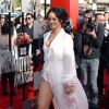 Rihanna assiste aux MTV Movie Awards 2014 au Nokia Theatre L.A. Live, habillée d'une robe et d'un body Ulyana Sergeenko (collection printemps-été 2014), et de sandales Manolo Blahnik. Los Angeles, le 13 avril 2014.