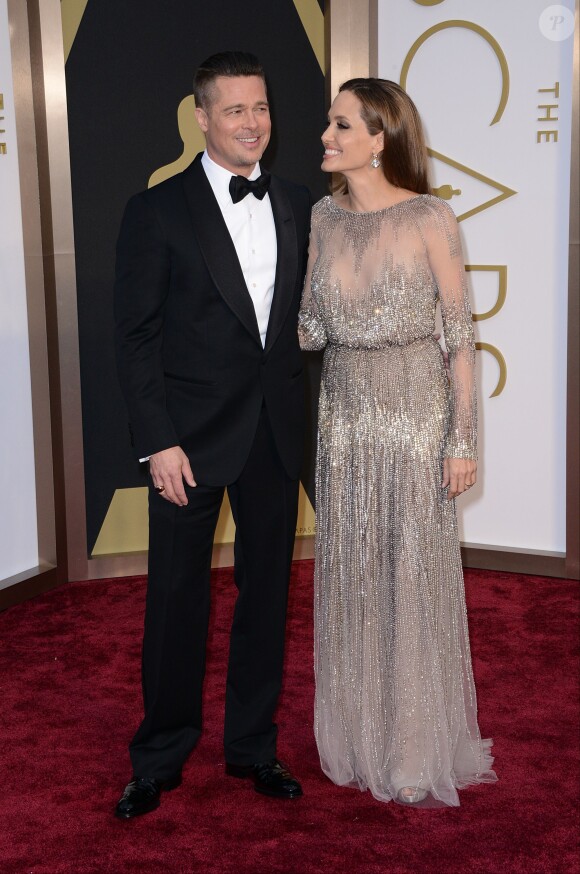 Brad Pitt et Angelina Jolie à la cérémonie des Oscars le 2 mars 2014.