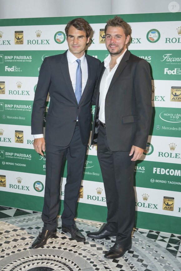 Roger Federer, Stanislas Wawrinka lors du Grand Gala du Tennis à Monaco le 18 avril 2014. 