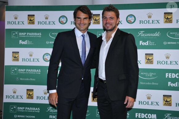 Roger Federer et Stanislas Wawrinka lors du Grand Gala du Tennis à Monaco le 18 avril 2014.