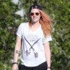 Exclusif - Kristen Stewart, les cheveux oranges, célèbre son 24e anniversaire en jouant au frisbee dans un parc à la Nouvelle-Orléans, le 9 avril 2014.
