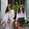 Kim et Kourtney Kardashian, ravissantes pour une après-midi shopping à Los Angeles. Le 21 avril 2014.