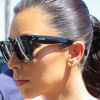 Kim Kardashian, en lunettes Céline et boucles d'oreille au nom de sa fille, North, se rend dans la boutique Canyon Beachwear à Studio City. Los Angeles, le 23 avril 2014.