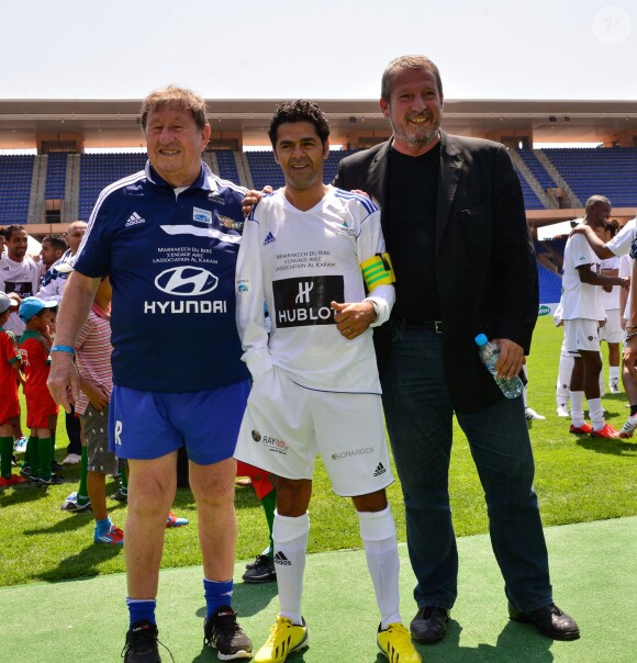 Guy Roux, Jamel Debbouze et Roland Courbis lors d'un match caritatif en juin 2013 à Marrakech