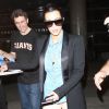 Kim Kardashian arrive à l'aéroport de LAX à Los Angeles après une visite éclair à Paris, le 1er mai 2014.