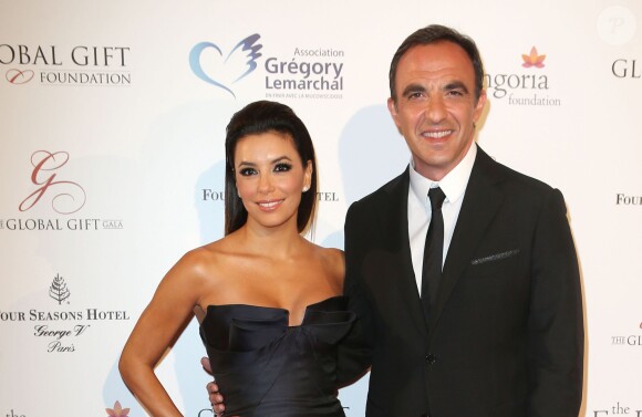 Eva Longoria et Nikos Aliagas - Soirée "Global Gift Gala 2014" à l'hôtel Four Seasons George V à Paris le 12 mai 2014.