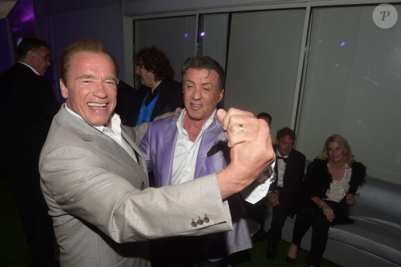 Arnold Schwarzenegger et Sylvester Stallone lors de la soirée du film Expendables au Gotha avec le joaillier De Grisogono, durant le Festival de Cannes le 18 mai 2014