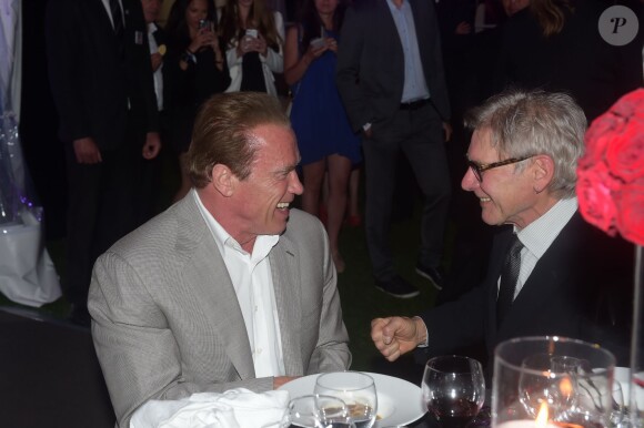 Arnold Schwarzenegger et Harrison Ford lors de la soirée du film Expendables au Gotha avec le joaillier De Grisogono, durant le Festival de Cannes le 18 mai 2014