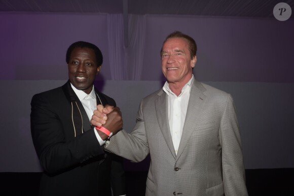 Wesley Snipes et Arnold Schwarzenegger lors de la soirée du film Expendables au Gotha avec le joaillier De Grisogono, durant le Festival de Cannes le 18 mai 2014