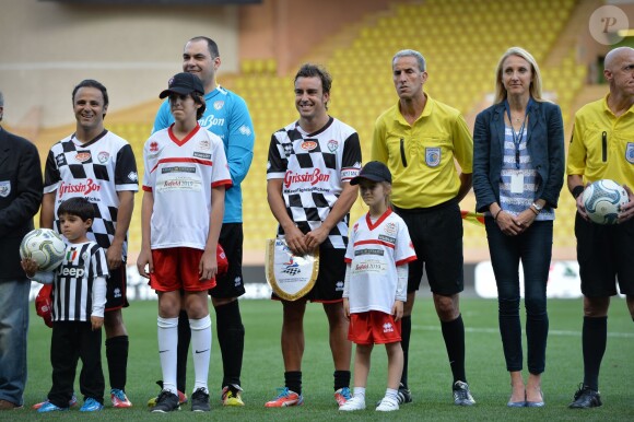 Felipe Massa, Fernando Alonso et Paula Radcliffe lors du World Stars Football Match entre la Star Team Monte Carlo et la F1 Driver Team, au stade Louis II de Monaco, le 20 mai 2014