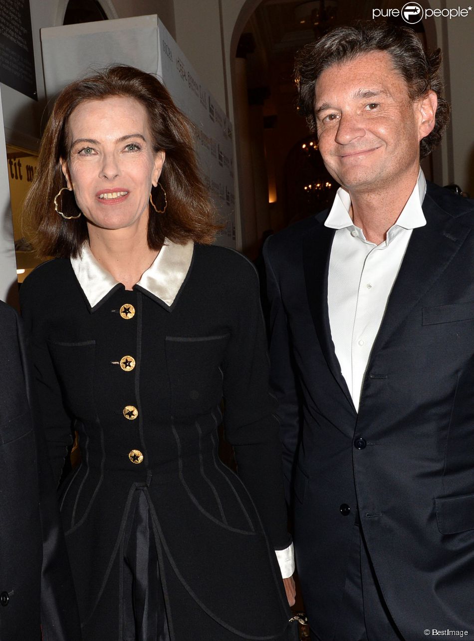 Carole Bouquet et son compagnon Philippe Sereys de Rothschild - Photocall de la 4&amp;egrave;me &amp;eacute;dition du Gala &quot; Planet Finance&quot; au Carlton &amp;agrave; l&#039;heure du Festival de Cannes le 15 mai 2014 