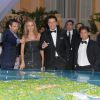 Domenico Giannini, John Travolta et sa femme Kelly Preston, Oscar Generale à la soirée "Puerto Azul Experience" lors du 67e festival de Cannes le 21 mai 2014.