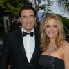John Travolta et sa femme Kelly Preston - Soirée "Puerto Azul Experience" lors du 67e festival de Cannes le 21 mai 2014.