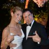 Heidi Klum, John Travolta - Soirée "Puerto Azul Experience" lors du 67e festival de Cannes le 21 mai 2014.
