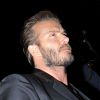 David Beckham à la sortie du restaurant Chiltern Firehouse, après la soirée de lancement de la collection de David Beckham pour H&M à Londres, le 14 mai 2014