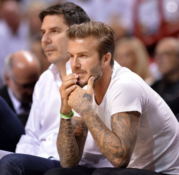 David Beckham et Marcelo Claure lors du premier match des demi-finales de la conférence Est entre le Heat de Miami et les Nets de Brooklyn, le 6 mai 2014 à Miami