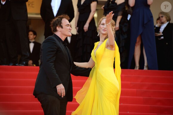 Quentin Tarantino, Uma Thurman à la montée des marches pour fêter les 20 ans de Pulp Fiction lors du 67e Festival du film de Cannes le 23 mai 2014.