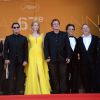 Quentin Tarantino, Uma Thurman, John Travolta, Kelly Preston and Lawrence Bender et Harvey Weinstein à la montée des marches pour fêter les 20 ans de Pulp Fiction lors du 67e Festival du film de Cannes le 23 mai 2014.