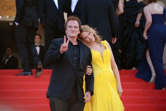 Quentin Tarantino, Uma Thurman à la montée des marches pour fêter les 20 ans de Pulp Fiction lors du 67e Festival du film de Cannes le 23 mai 2014.