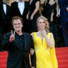 Quentin Tarantino, Uma Thurman à la montée des marches pour fêter les 20 ans de Pulp Fiction lors du 67e Festival du film de Cannes le 23 mai 2014.