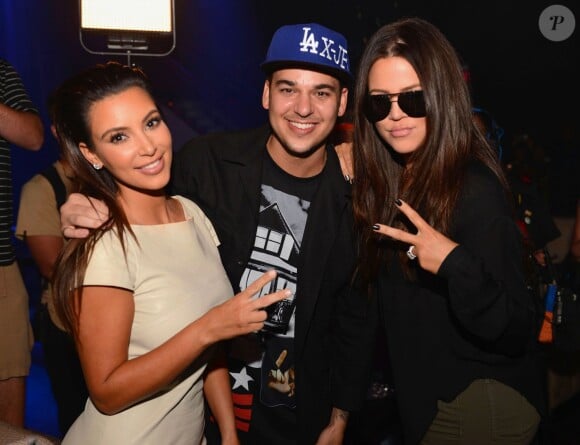 Kim, Rob et Khloé Kardashian à Miami. Septembre 2012.
