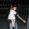 David Beckham et sa fille Harper arrivent à l'aéroport de Los Angeles. Le 23 mai 2014.