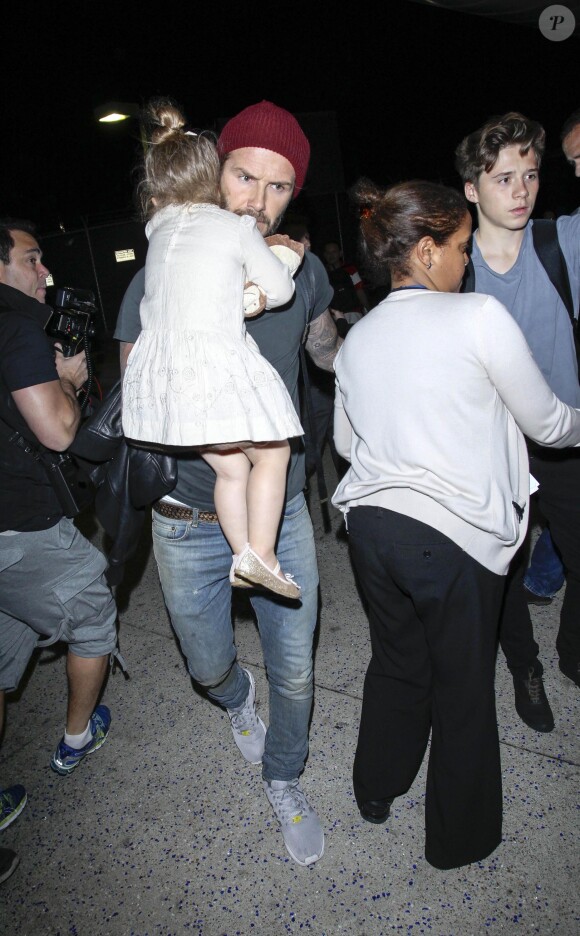 David Beckham et ses enfants Harper et Brooklyn arrivent à l'aéroport de Los Angeles. Le 23 mai 2014.
