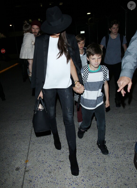 Victoria, David Beckham et leurs enfants Brooklyn, Romeo, Cruz et Harper arrivent à l'aéroport de LAX. Los Angeles, le 23 mai 2014.