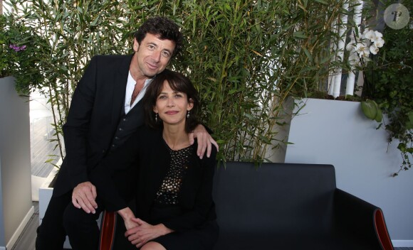 Exclusif - Sophie Marceau et Patrick Bruel posant pour notre photographe lors du Festival du film de Cannes - Pavillon Unifrance le 18 mai 2014