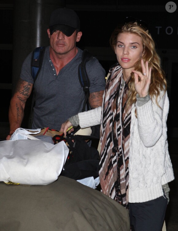 AnnaLynne McCord et son compagnon Dominic Purcell arrivent à Los Angeles, le 26 février 2014. 