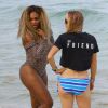 Serena Williams et Caroline Wozniacki profitent du beau temps sur une plage à Miami, le 31 mai 2014.