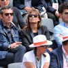 Jean-Luc Reichmann et sa compagne Nathalie aux Internationaux de France de tennis de Roland-Garros à Paris, le 1er juin 2014.