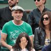 Jean-Marc Barr et sa compagne aux Internationaux de France de tennis de Roland-Garros à Paris, le 1er juin 2014.