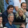 Marie Sara et son mari Christophe Lambert aux Internationaux de France de tennis de Roland-Garros à Paris, le 1er juin 2014.