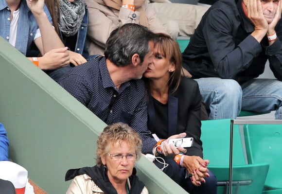 Jean-Luc Reichmann et sa compagne Nathalie aux Internationaux de France de tennis de Roland Garros à Paris le 1er juin 2014.01/06/2014 - Paris