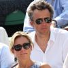 Anne-Sophie Lapix et son mari Arthur Sadoun à la finale homme des Internationaux de France de tennis de Roland Garros à Paris le 8 juin 2014.