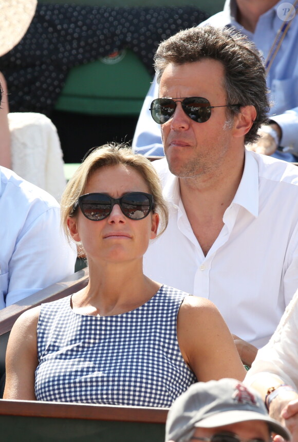 Anne-Sophie Lapix et son mari Arthur Sadoun à la finale homme des Internationaux de France de tennis de Roland Garros à Paris le 8 juin 2014.