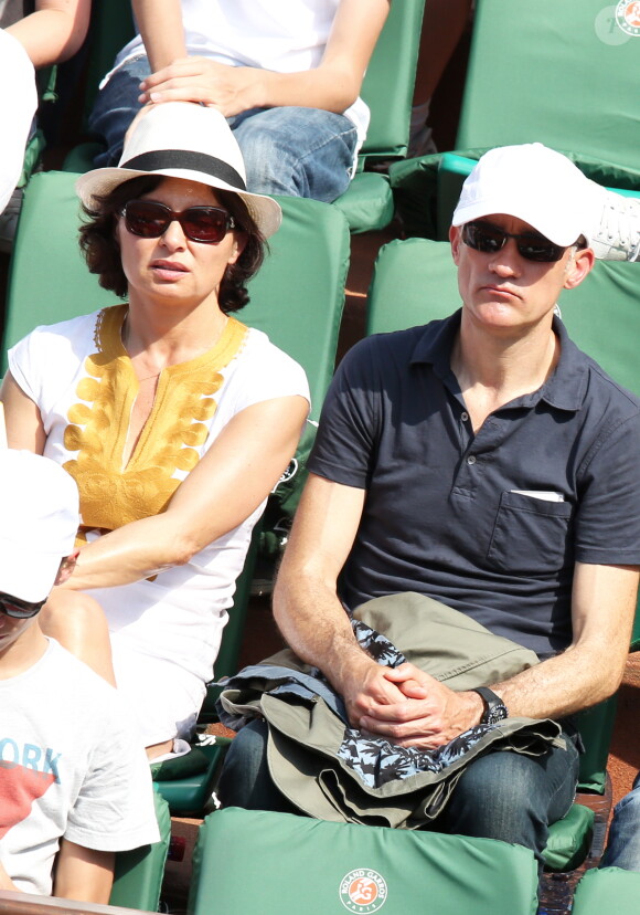 Gilles Bouleau et sa femme à la finale homme des Internationaux de France de tennis de Roland Garros à Paris le 8 juin 2014.
