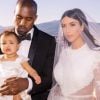 Kim Kardashian et Kanye West avec leur fille North, lors de leur mariage à Florence le 24 mai 2014.