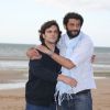 Pio Marmaï et Ramzy Bédia sur la plage lors du Festival du film romantique de Cabourg, le 14 juin 2014.