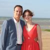Emilie Dequenne et son fiancé Michel Ferracci sur la plage lors du Festival du film romantique de Cabourg, le 14 juin 2014.
