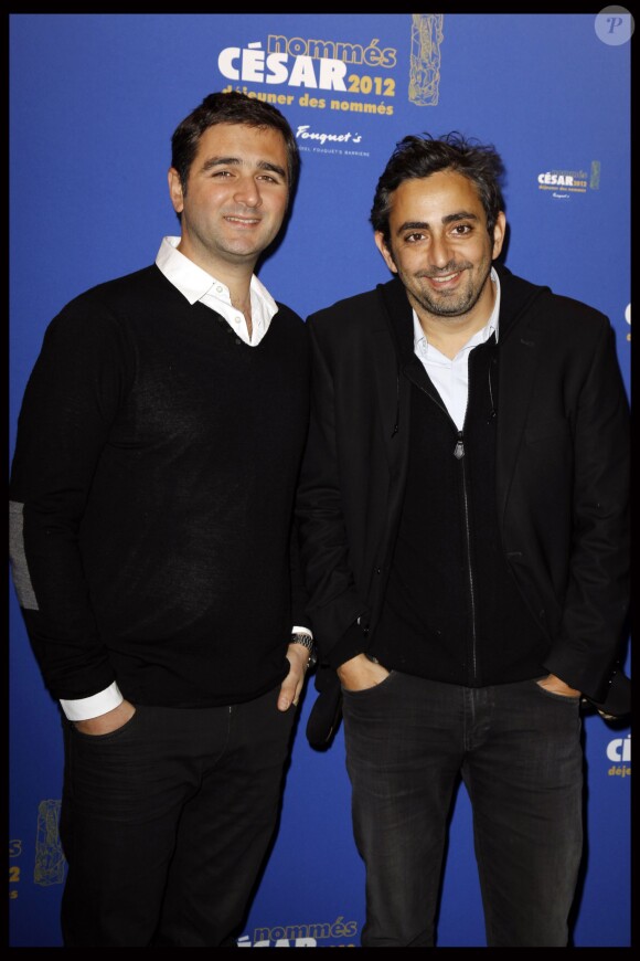 Olivier Nakache et Eric Toledano lors du déjeuner des César à Paris le 4 février 2012