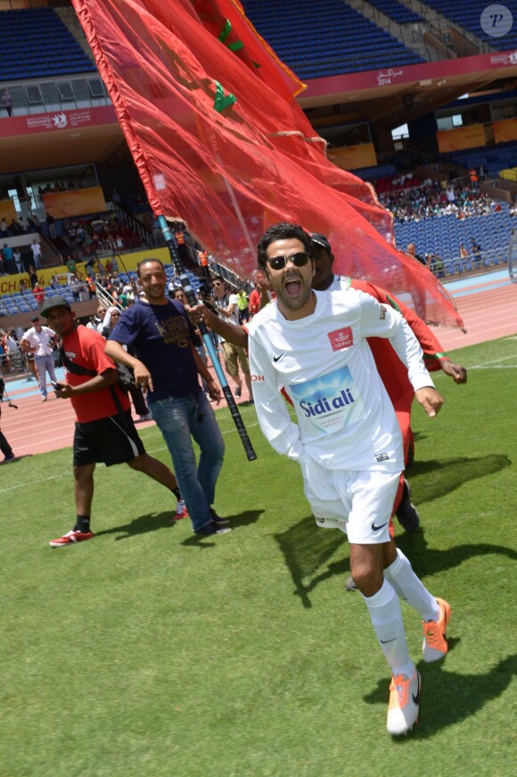 Jamel Debbouze - Un "Charity Game du Marrakech du Rire 2014", match de foot caritatif, a été organisé, permettant de reverser 300 000 dirhams (27 000 euros) aux associations "Al Karam" et "L'Heure Joyeuse" le 15 juin 2014.