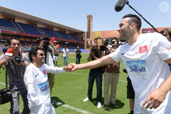 Jamel Debbouze et Adil Rami - Un "Charity Game du Marrakech du Rire 2014", match de foot caritatif, a été organisé, permettant de reverser 300 000 dirhams (27 000 euros) aux associations "Al Karam" et "L'Heure Joyeuse" le 15 juin 2014.
