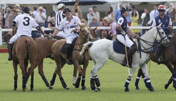 Le prince William, duc de Cambridge, et le prince Harry - Match caritatif de polo June Goldin Group Charity Cup, au Beaufort Polo Club, à Tetbury, Gloucestershire, le 22 juin 2014.